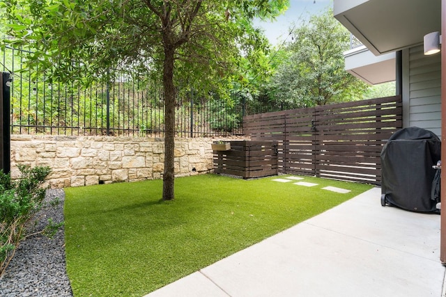 3100 Menchaca Rd Unit 33, Austin, TX 78704 - view of yard featuring a patio