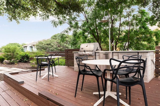 3100 Menchaca Rd Unit 33, Austin, TX 78704 - wooden terrace featuring outdoor dining area