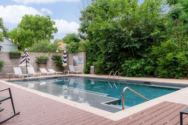 3100 Menchaca Rd Unit 33, Austin, TX 78704 - community pool featuring a wooden deck