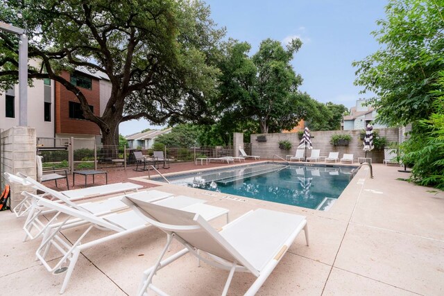 3100 Menchaca Rd Unit 33, Austin, TX 78704 - community pool featuring a patio area
