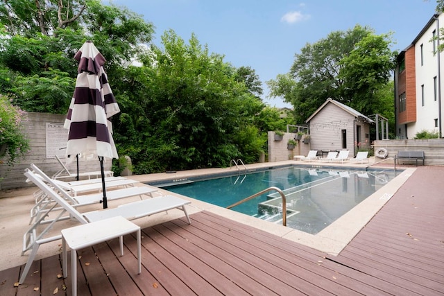 3100 Menchaca Rd Unit 33, Austin, TX 78704 - view of pool featuring a wooden deck and view of scattered trees