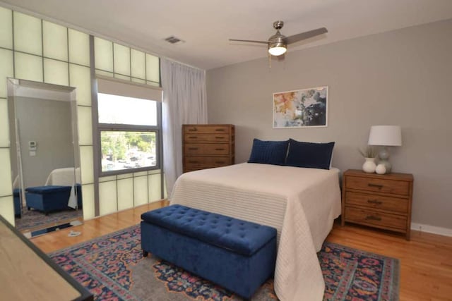 6000 S Congress Ave Unit 132, Austin, TX 78745 - bedroom with wood finished floors and baseboards