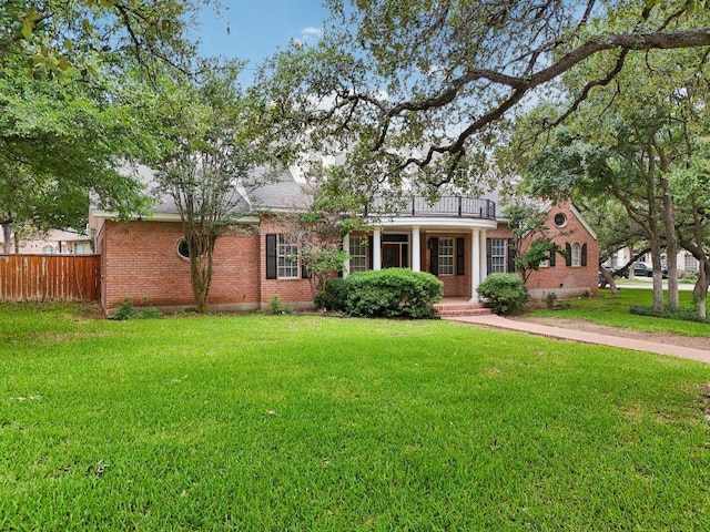 30418 La Quinta Dr, Georgetown, TX 78628 - view of front of home with brick siding and a porch