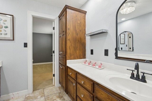 30418 La Quinta Dr, Georgetown, TX 78628 - bathroom featuring vanity and baseboards