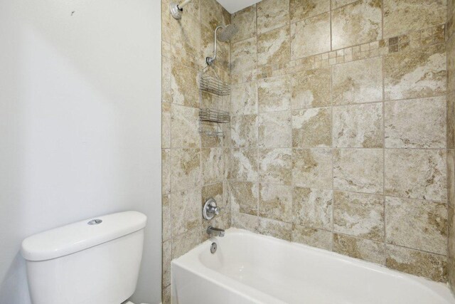30418 La Quinta Dr, Georgetown, TX 78628 - bathroom featuring toilet and washtub / shower combination