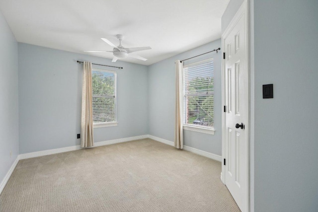 30418 La Quinta Dr, Georgetown, TX 78628 - unfurnished room with ceiling fan, light colored carpet, and baseboards