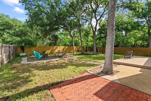 811 Timber Trl, Cedar Park, TX 78613 - view of yard featuring a fire pit, a deck, and a patio