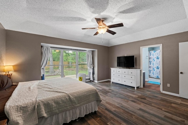 811 Timber Trl, Cedar Park, TX 78613 - bedroom featuring dark wood finished floors, a textured ceiling, baseboards, connected bathroom, and ceiling fan