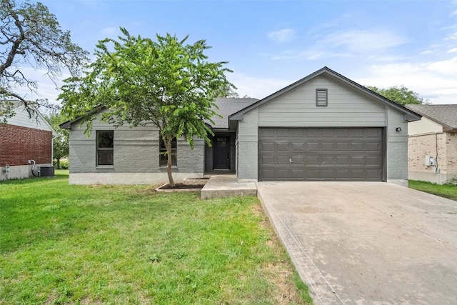 2012 Mimosa Trl, Round Rock, TX 78664 - ranch-style house with an attached garage, concrete driveway, a front lawn, and central AC