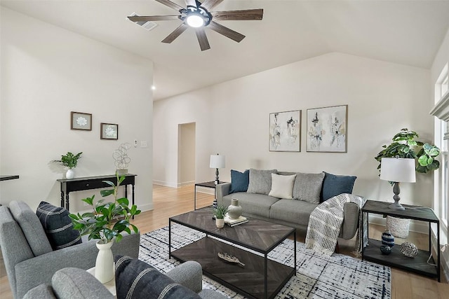 2012 Mimosa Trl, Round Rock, TX 78664 - living room featuring a ceiling fan, light wood finished floors, lofted ceiling, and baseboards