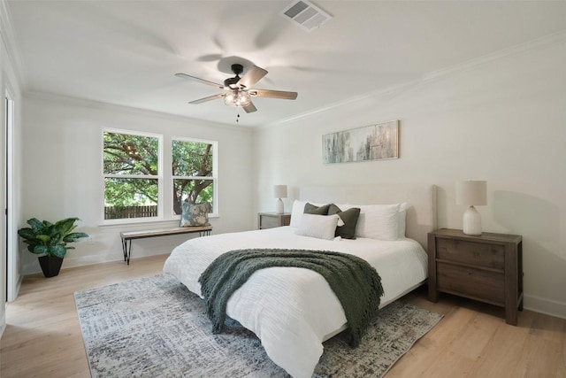 2012 Mimosa Trl, Round Rock, TX 78664 - bedroom with ornamental molding, light wood finished floors, baseboards, and a ceiling fan