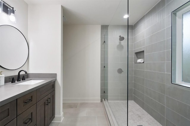 2012 Mimosa Trl, Round Rock, TX 78664 - full bathroom featuring walk in shower, vanity, tile patterned floors, and baseboards