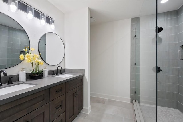 2012 Mimosa Trl, Round Rock, TX 78664 - full bath featuring double vanity, a walk in shower, baseboards, and tile patterned flooring