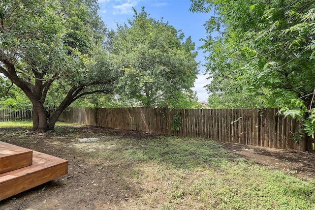 2012 Mimosa Trl, Round Rock, TX 78664 - fenced backyard featuring a wooden deck