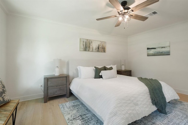 2012 Mimosa Trl, Round Rock, TX 78664 - bedroom with ornamental molding, light wood-style floors, baseboards, and a ceiling fan