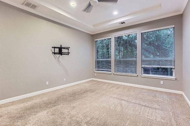 2607 Deep River Cir, Round Rock, TX 78665 - carpeted spare room featuring a raised ceiling, ceiling fan, and recessed lighting