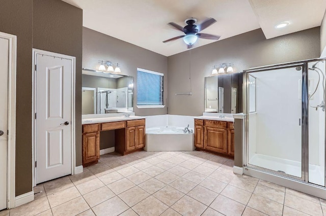 2607 Deep River Cir, Round Rock, TX 78665 - bathroom featuring a shower stall, a bath, two vanities, tile patterned floors, and a ceiling fan
