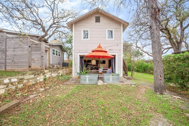 1406 Summit St, Austin, TX 78741 - rear view of property featuring cooling unit and a gazebo