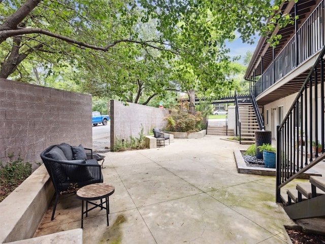 1503 W 9th St Unit 204, Austin, TX 78703 - view of patio with stairs and an outdoor hangout area