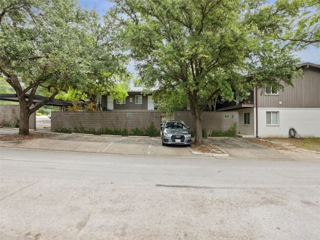 1503 W 9th St Unit 204, Austin, TX 78703 - obstructed view of property featuring uncovered parking