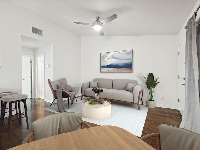 1503 W 9th St Unit 204, Austin, TX 78703 - living area with dark wood finished floors, baseboards, and ceiling fan