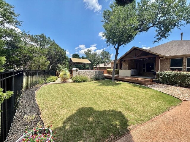 707 Mendocino Ln, Austin, TX 78737 - view of yard with a wooden deck