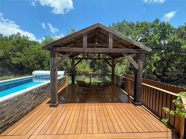 707 Mendocino Ln, Austin, TX 78737 - wooden terrace with a gazebo and view of wooded area