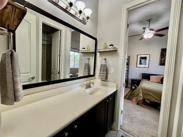 707 Mendocino Ln, Austin, TX 78737 - ensuite bathroom featuring vanity, ceiling fan, and tile patterned flooring