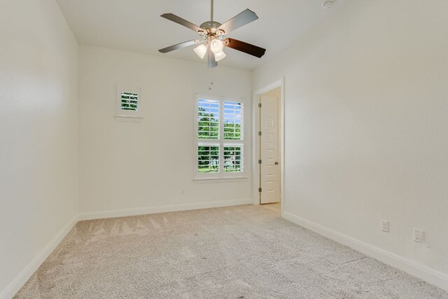 119 Loysoya St, Bastrop, TX 78602 - spare room with a ceiling fan, light colored carpet, and baseboards