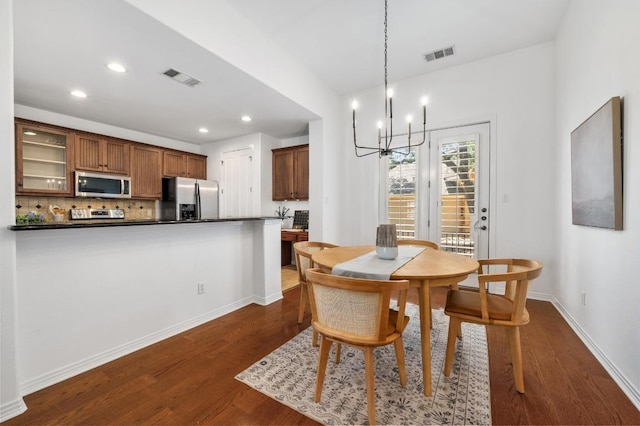 6201 River Place Blvd Unit 4, Austin, TX 78730 - dining room with a chandelier, dark wood-style floors, and recessed lighting