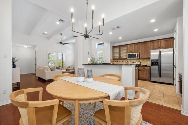 6201 River Place Blvd Unit 4, Austin, TX 78730 - dining room featuring a ceiling fan, recessed lighting, and a chandelier