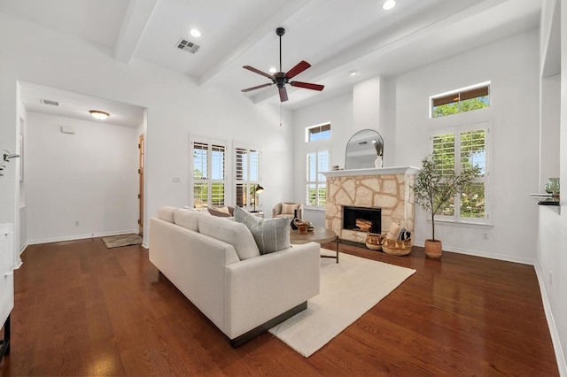 6201 River Place Blvd Unit 4, Austin, TX 78730 - living area featuring ceiling fan, beam ceiling, dark wood-style floors, a stone fireplace, and recessed lighting