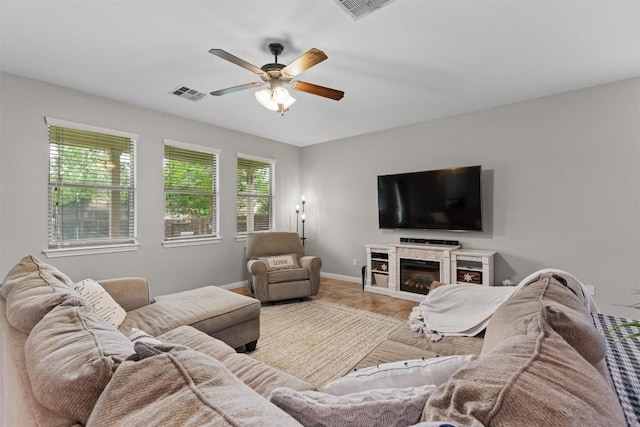 1017 Sussex Way, Round Rock, TX 78665 - living room with a ceiling fan and baseboards