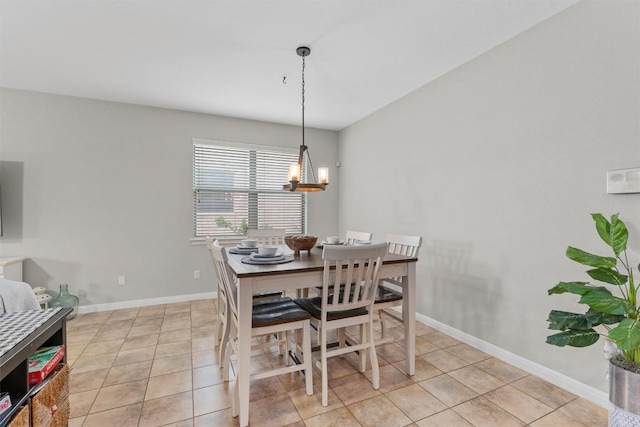 1017 Sussex Way, Round Rock, TX 78665 - dining area featuring light tile patterned floors, a chandelier, and baseboards