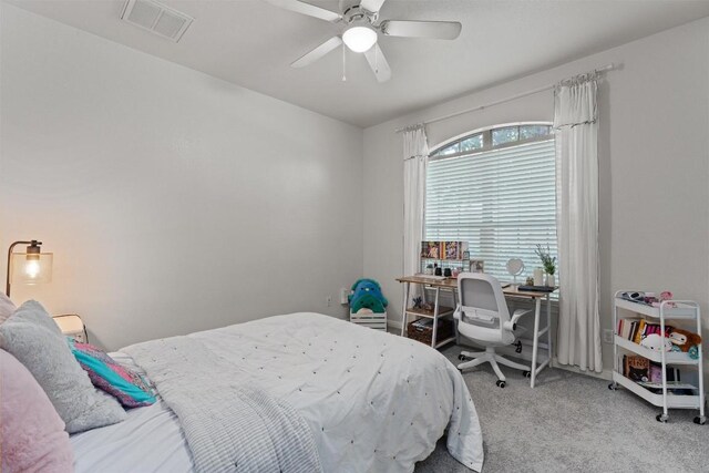 1017 Sussex Way, Round Rock, TX 78665 - carpeted bedroom featuring a ceiling fan