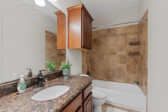 1017 Sussex Way, Round Rock, TX 78665 - full bathroom featuring toilet, vanity, bathtub / shower combination, and tile patterned floors