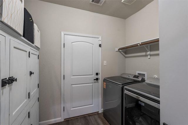 2612 American Dr, Lago Vista, TX 78645 - washroom featuring separate washer and dryer and dark wood-style flooring