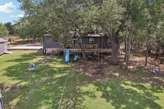 360 Little Barton Dr, Dripping Springs, TX 78620 - view of green lawn with a deck