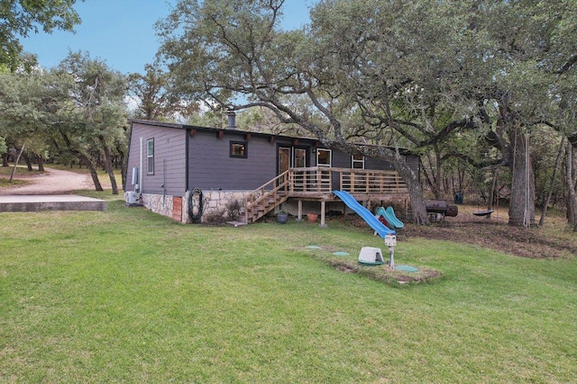 360 Little Barton Dr, Dripping Springs, TX 78620 - rear view of house with a yard and stairway