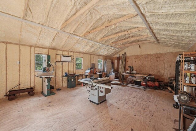 360 Little Barton Dr, Dripping Springs, TX 78620 - misc room featuring lofted ceiling, a wall unit AC, and a workshop area