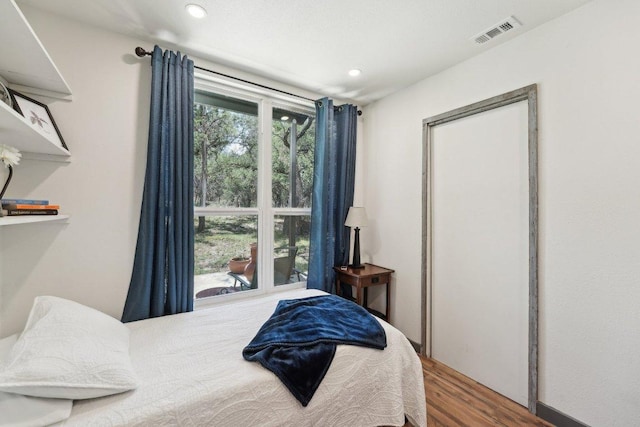 360 Little Barton Dr, Dripping Springs, TX 78620 - bedroom featuring wood finished floors and recessed lighting