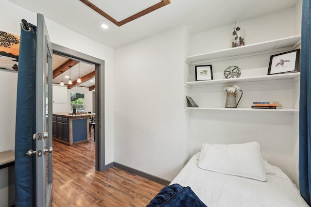 360 Little Barton Dr, Dripping Springs, TX 78620 - bedroom with wood finished floors, recessed lighting, and baseboards