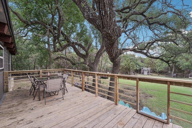 360 Little Barton Dr, Dripping Springs, TX 78620 - wooden deck with outdoor dining area