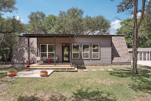 360 Little Barton Dr, Dripping Springs, TX 78620 - back of house with a yard