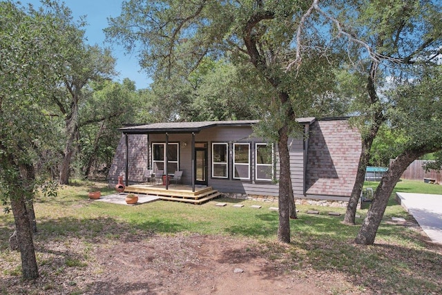 360 Little Barton Dr, Dripping Springs, TX 78620 - view of front of property featuring a front lawn
