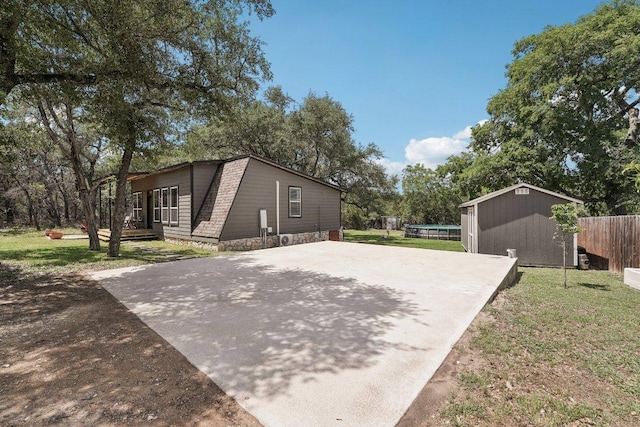 360 Little Barton Dr, Dripping Springs, TX 78620 - view of home's exterior with driveway