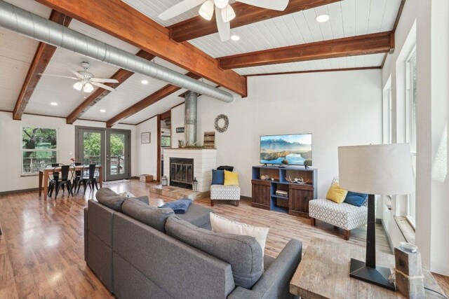 360 Little Barton Dr, Dripping Springs, TX 78620 - living room with ceiling fan, wood finished floors, recessed lighting, and a fireplace