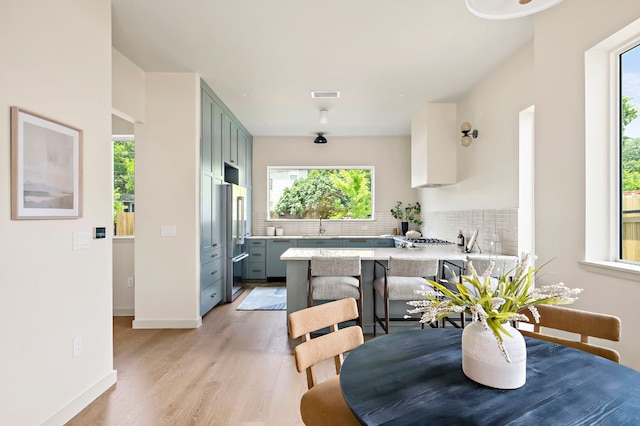 2403 E 22nd St, Austin, TX 78722 - dining room with healthy amount of natural light and light wood-style flooring