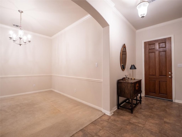 2214 Yellow Bird Trl, Austin, TX 78734 - carpeted entrance foyer with ornamental molding, arched walkways, baseboards, and a chandelier