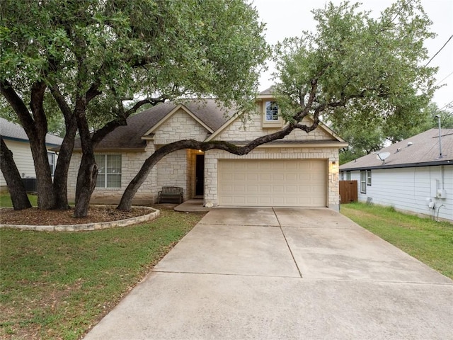 2214 Yellow Bird Trl, Austin, TX 78734 - view of front of property featuring stone siding, driveway, a front yard, and a garage